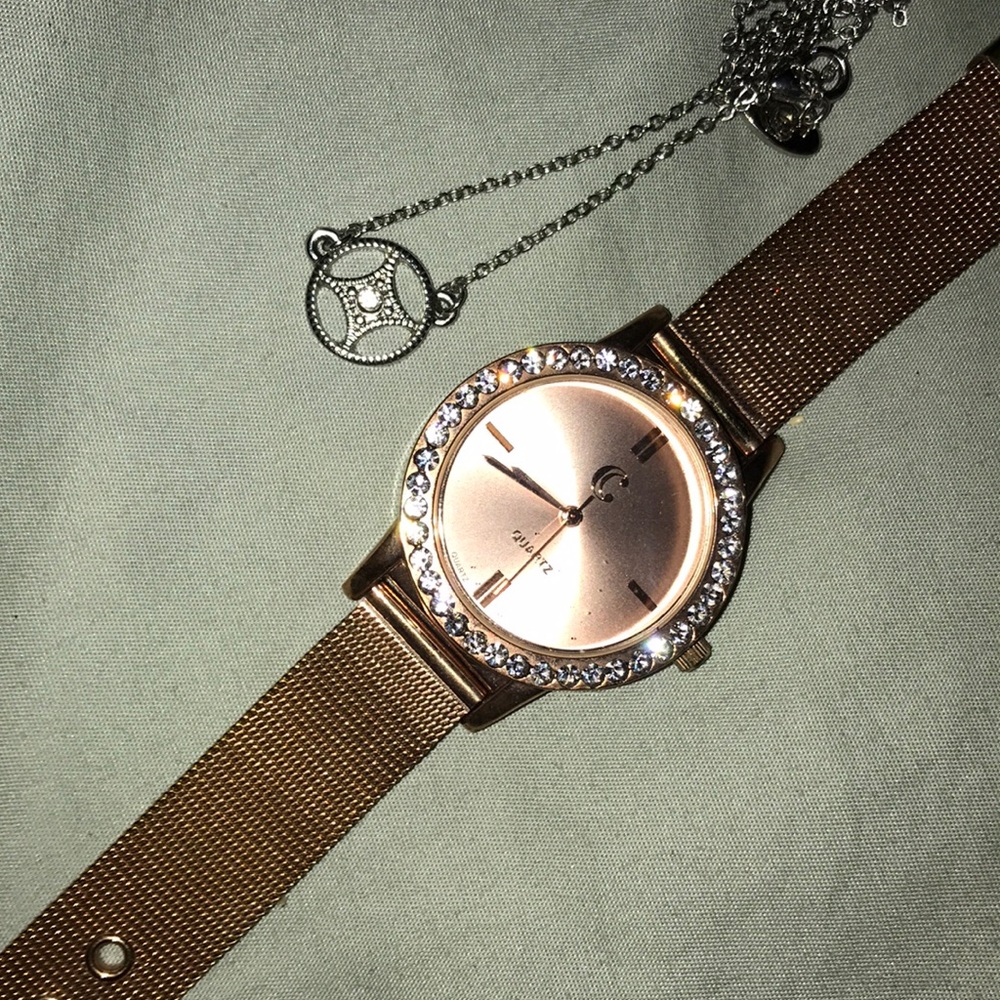 Rose gold watch with necklace